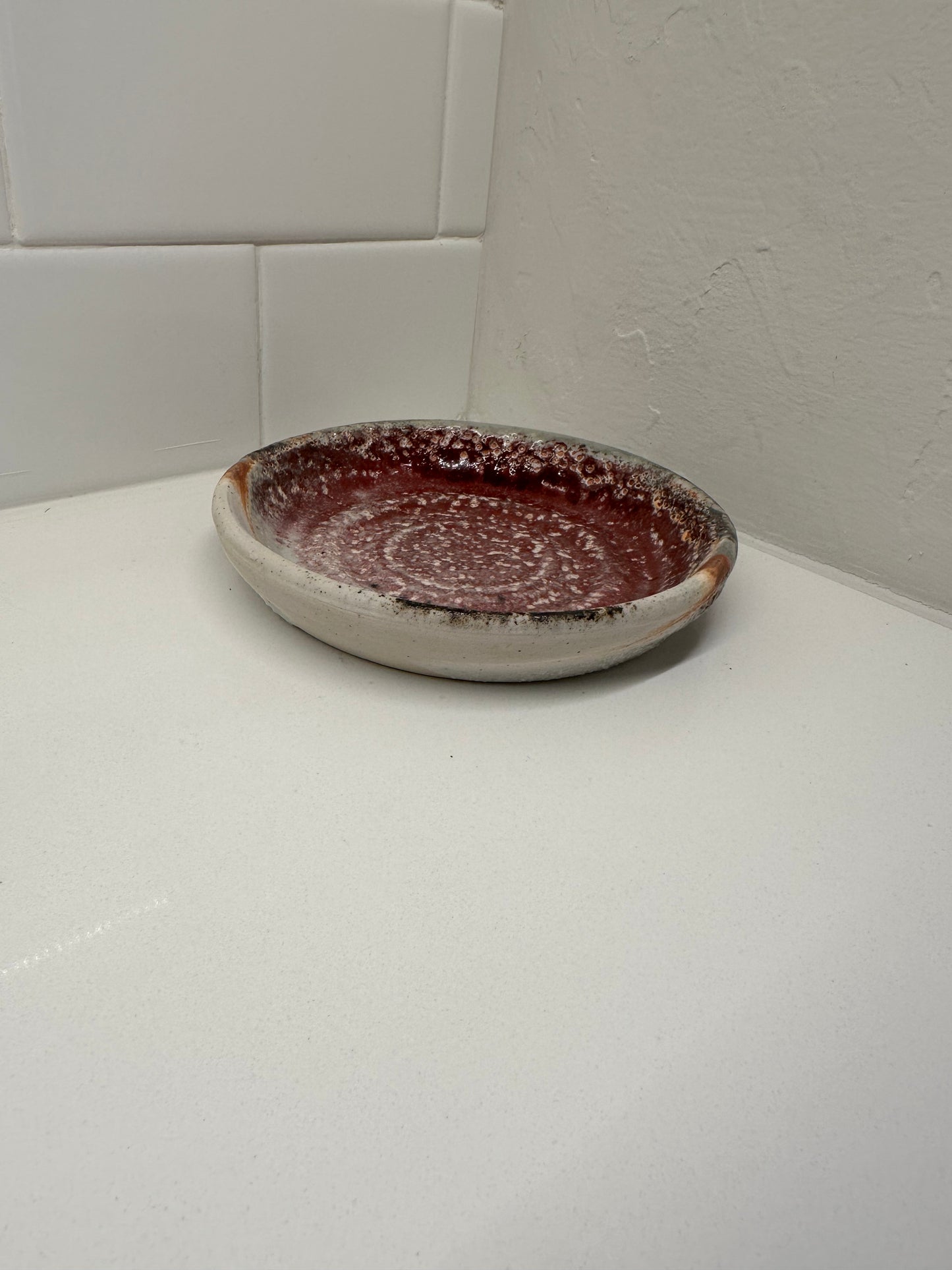 "Simple practice" shallow bowl in oxidized wine